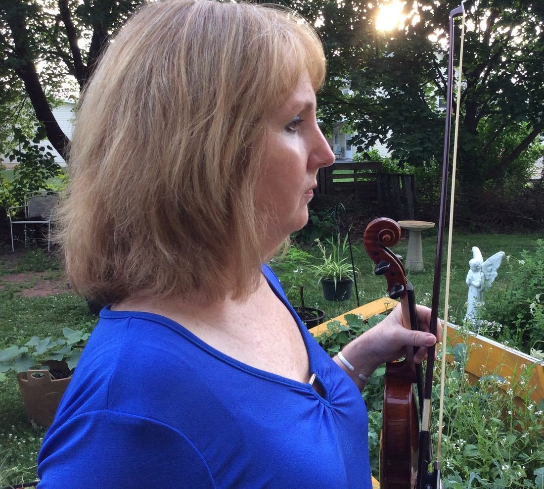 Tish Brown playing fiddle